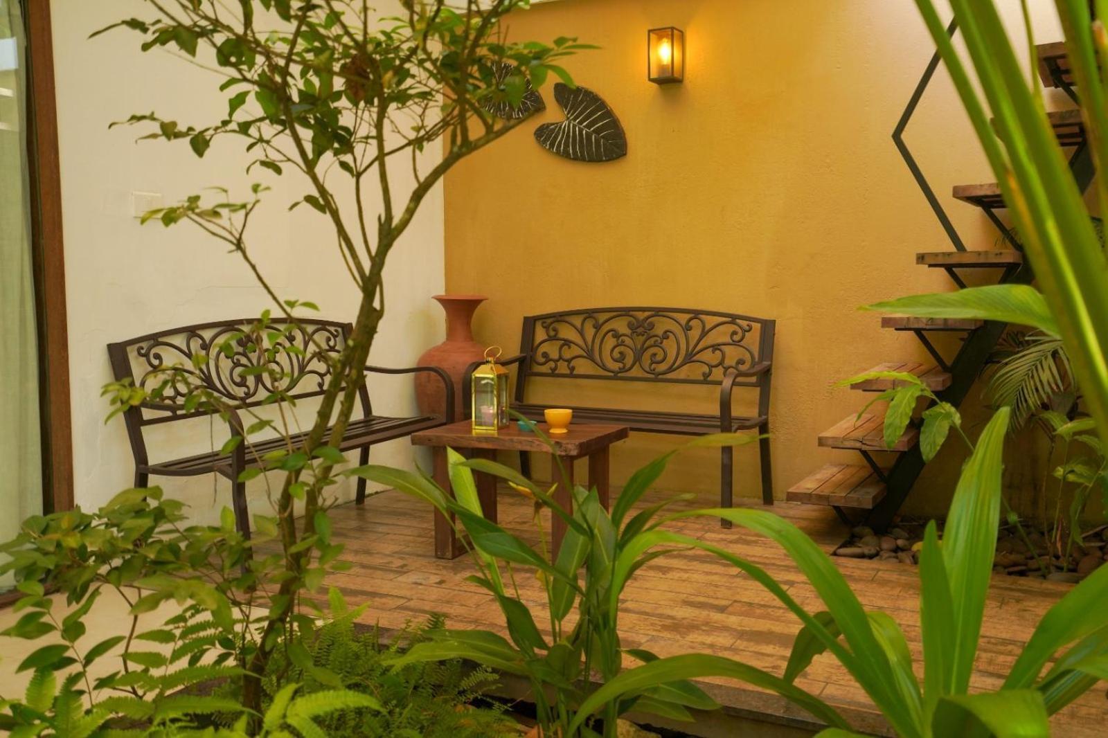 Le Candles Resort Calecute Quarto foto